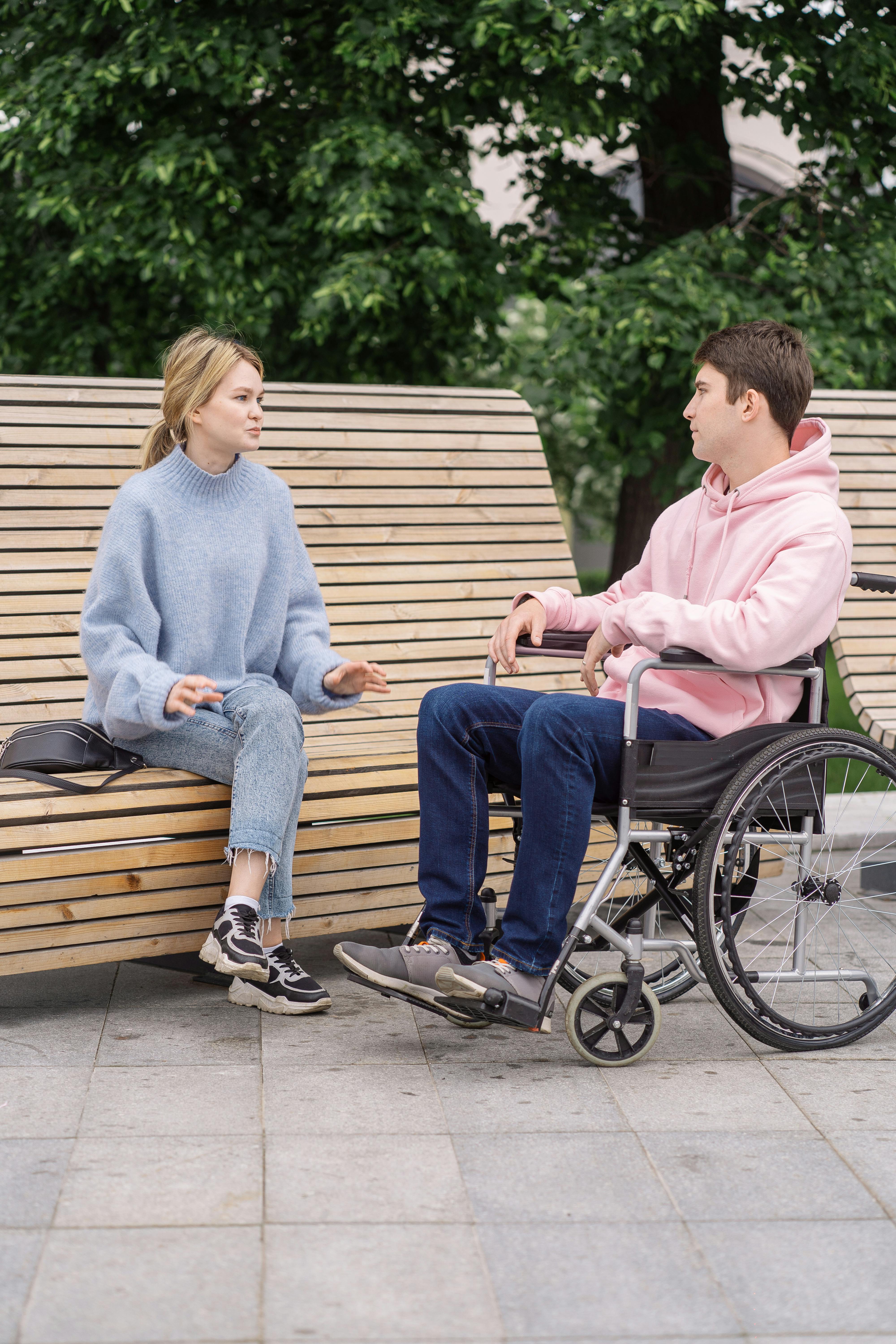 Support worker and participant in conversation